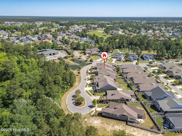 9036 Island Rider Ct NE, Leland, NC 28451 - aerial view featuring a water view and a residential view