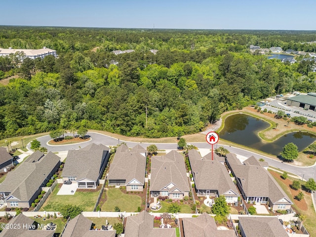 9036 Island Rider Ct NE, Leland, NC 28451 - bird's eye view with a forest view, a residential view, and a water view
