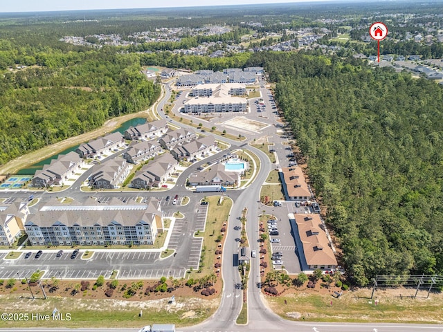 9036 Island Rider Ct NE, Leland, NC 28451 - aerial view featuring a residential view and a wooded view