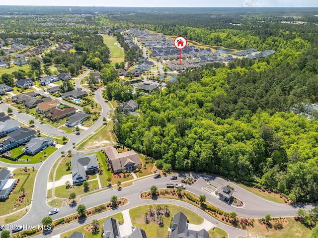 9036 Island Rider Ct NE, Leland, NC 28451 - drone / aerial view with a residential view and a wooded view