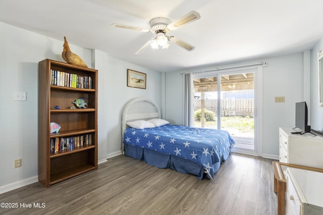 bedroom featuring a ceiling fan, baseboards, access to exterior, and wood finished floors