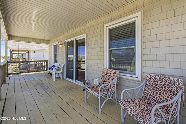 wooden terrace with covered porch