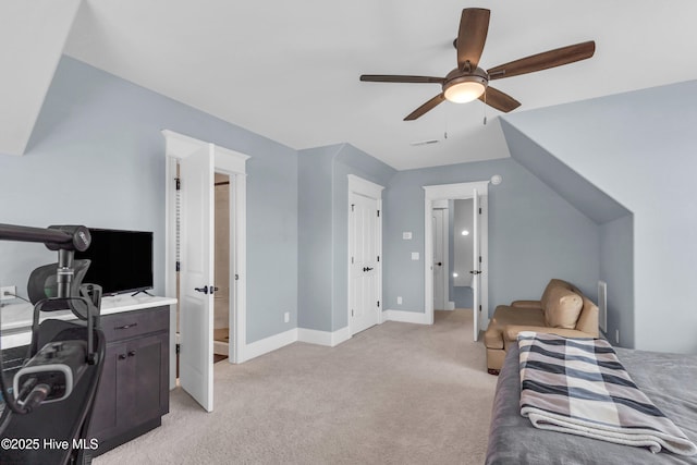 bedroom featuring baseboards, visible vents, ceiling fan, and light colored carpet