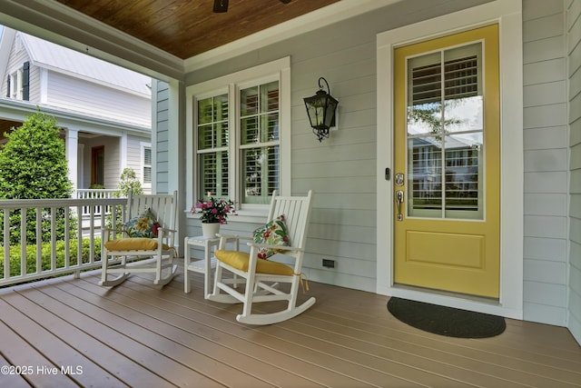 wooden terrace featuring a porch