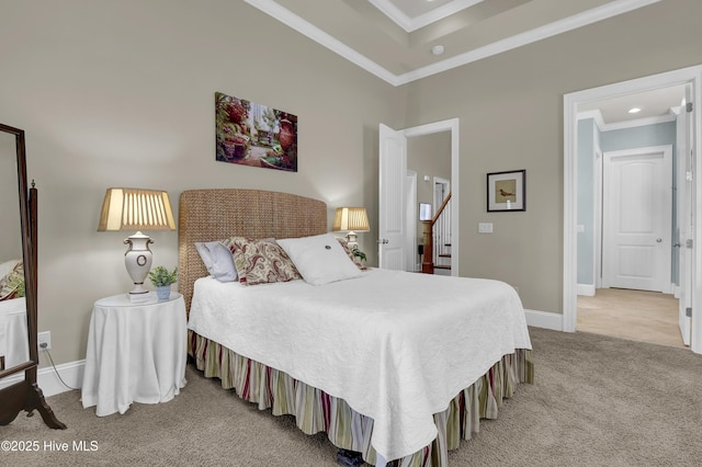 carpeted bedroom featuring ornamental molding, baseboards, and recessed lighting