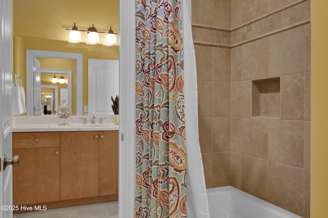 full bathroom featuring vanity and tile patterned floors