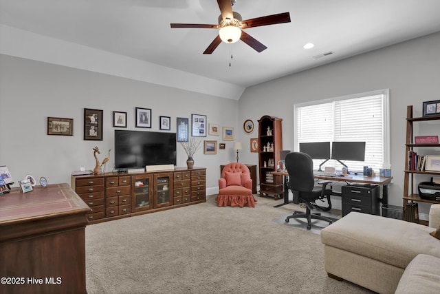 carpeted office featuring a ceiling fan and vaulted ceiling