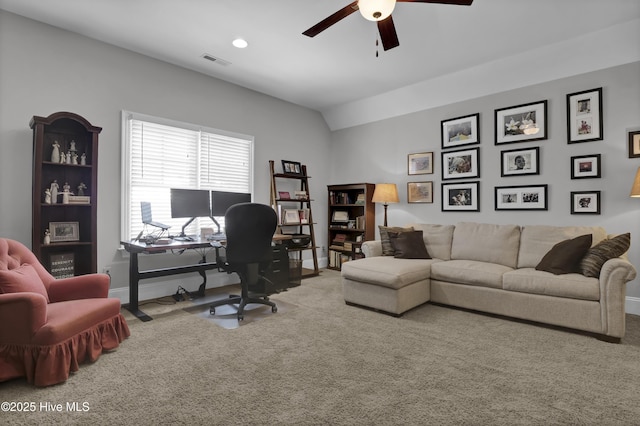 carpeted office space featuring ceiling fan, baseboards, and recessed lighting