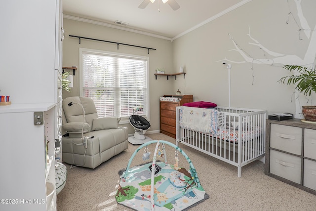 421 Celtic Ash St, Sneads Ferry, NC 28460 - bedroom featuring visible vents, a ceiling fan, crown molding, and a nursery area