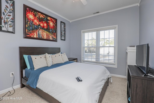 bedroom featuring baseboards, ornamental molding, light colored carpet, and visible vents