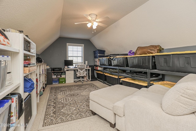 interior space featuring ceiling fan and lofted ceiling