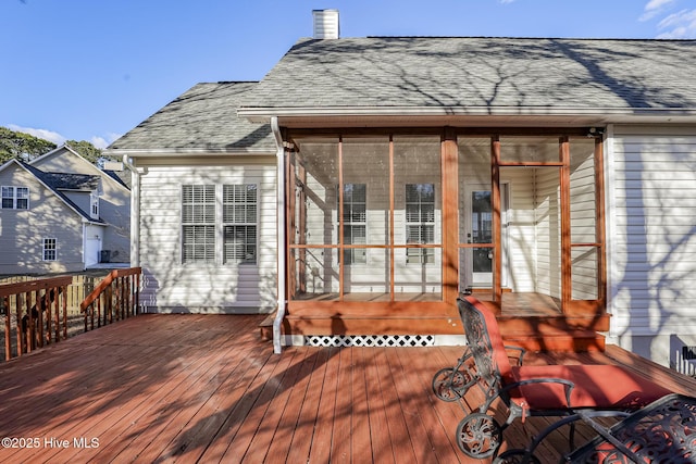 deck featuring a sunroom