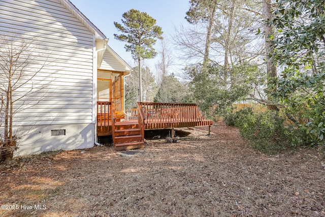 view of yard with a deck