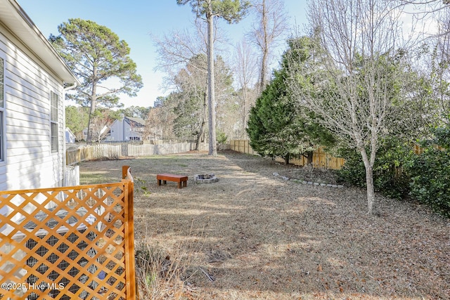 view of yard with a fenced backyard