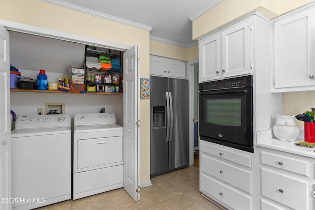 703 Baby Doe Cir, Hampstead, NC 28443 - clothes washing area featuring independent washer and dryer, laundry area, and crown molding
