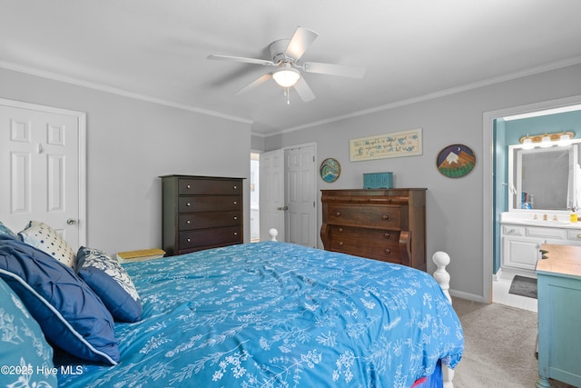 703 Baby Doe Cir, Hampstead, NC 28443 - bedroom with a sink, crown molding, carpet, and ensuite bathroom