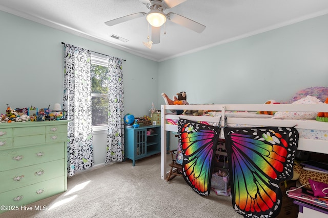 703 Baby Doe Cir, Hampstead, NC 28443 - bedroom with ceiling fan, visible vents, ornamental molding, and carpet