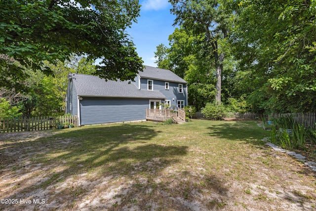 703 Baby Doe Cir, Hampstead, NC 28443 - view of yard with a wooden deck and a fenced backyard