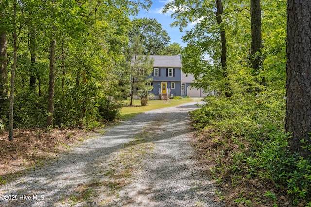703 Baby Doe Cir, Hampstead, NC 28443 - view of front facade featuring driveway