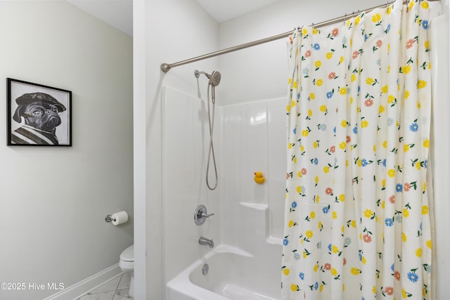 full bathroom with toilet, baseboards, marble finish floor, and shower / bath combo with shower curtain