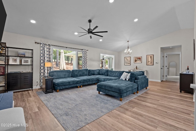 180 Lancashire Ln, West End, NC 27376 - living room featuring lofted ceiling, baseboards, recessed lighting, light wood-style flooring, and ceiling fan with notable chandelier