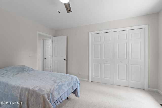 180 Lancashire Ln, West End, NC 27376 - carpeted bedroom featuring baseboards, a ceiling fan, and a closet