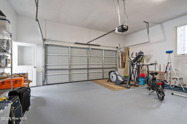 180 Lancashire Ln, West End, NC 27376 - garage featuring a garage door opener