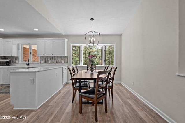 180 Lancashire Ln, West End, NC 27376 - dining space featuring recessed lighting, light wood finished floors, baseboards, and a chandelier