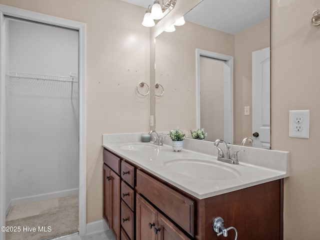 212 Peaceful Ln, Hubert, NC 28539 - full bath with double vanity, a sink, and a walk in closet