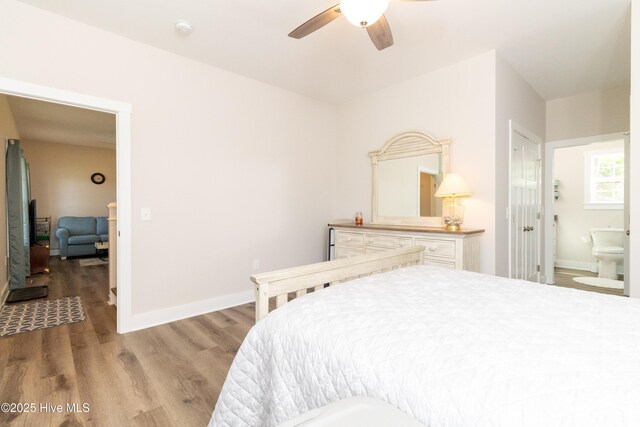 151 Windsor Ln, Edenton, NC 27932 - bedroom with light wood-style floors, a ceiling fan, baseboards, and ensuite bathroom