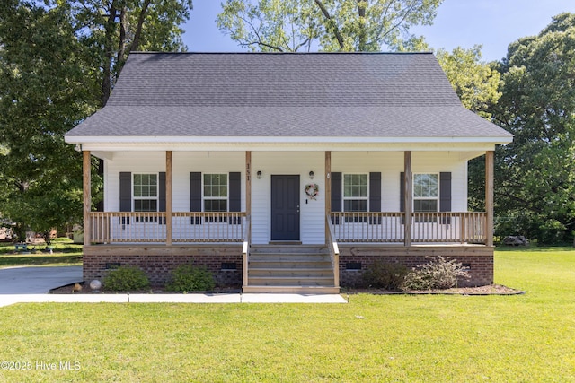 151 Windsor Ln, Edenton, NC 27932 - view of front of property featuring a shingled roof, covered porch, and a front yard
