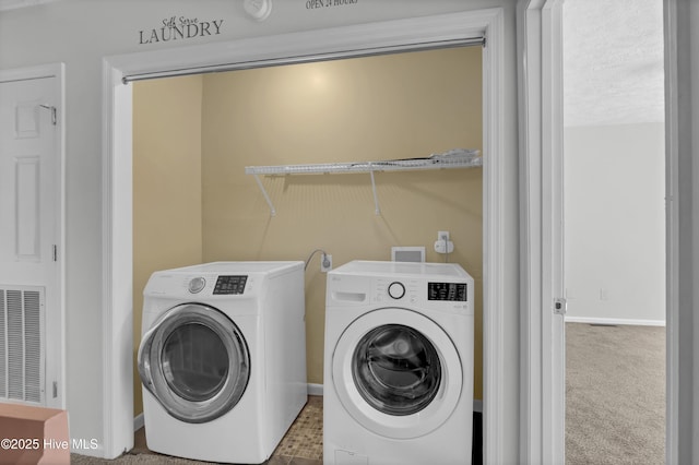 10165 Creekside Dr SE Apt 1, Leland, NC 28451 - laundry room featuring separate washer and dryer and carpet