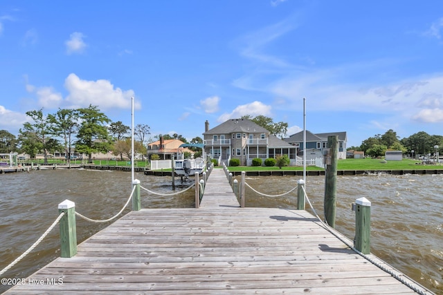 view of dock with a water view