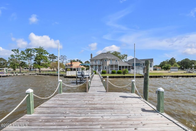 dock area with a water view