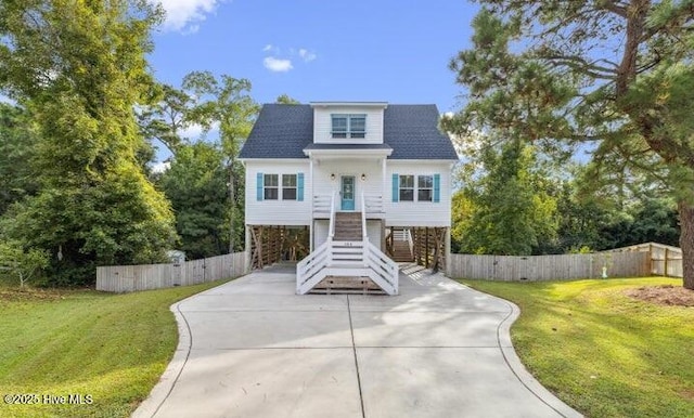 104 Affirmed Pl, Sneads Ferry, NC 28460 - view of front of property with stairway, a carport, and concrete driveway
