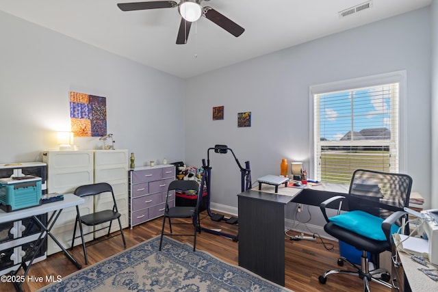 office featuring ceiling fan, wood finished floors, and baseboards