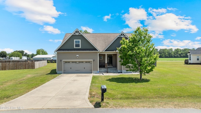 craftsman inspired home featuring driveway, an attached garage, and roof with shingles