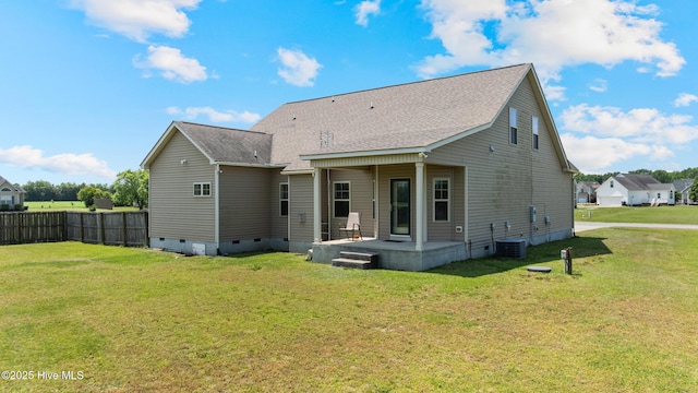 rear view of property with crawl space, roof with shingles, and central AC
