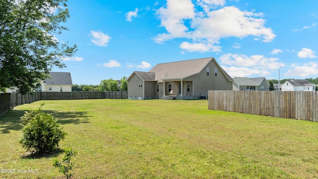 rear view of property with crawl space
