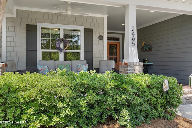 2465 Meridian Rd NE, Leland, NC 28451 - view of exterior entry with ceiling fan and covered porch