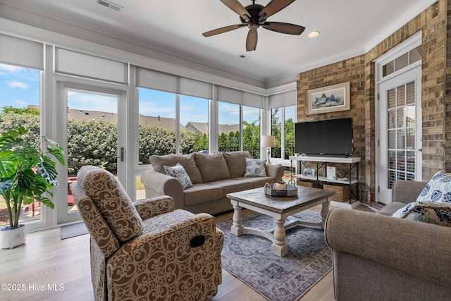 2465 Meridian Rd NE, Leland, NC 28451 - sunroom featuring visible vents, recessed lighting, crown molding, and wood finished floors