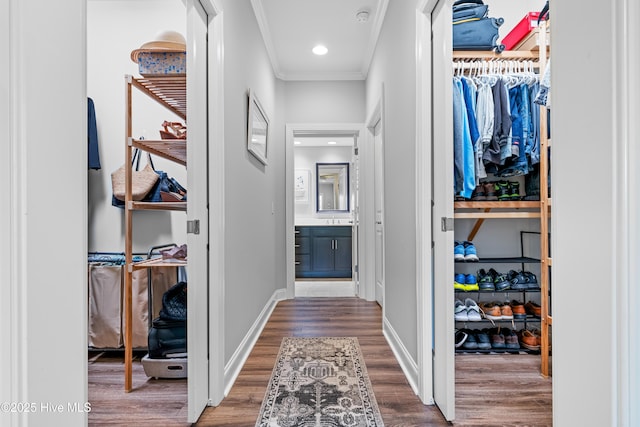 2465 Meridian Rd NE, Leland, NC 28451 - hall with baseboards, ornamental molding, dark wood finished floors, and recessed lighting