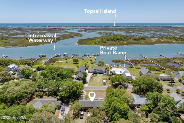 bird's eye view featuring a residential view and a water view