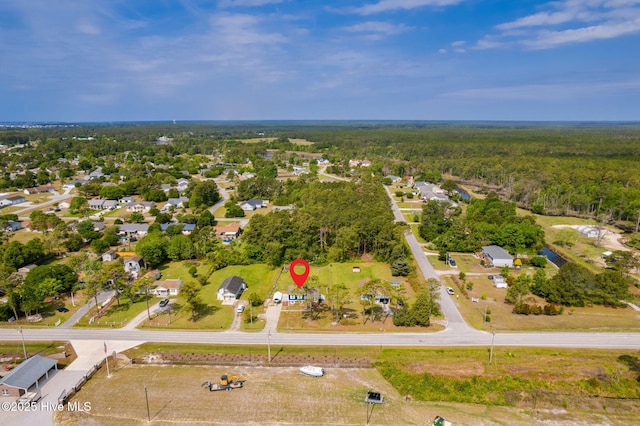 aerial view with a view of trees and a residential view