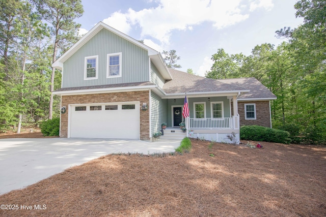 4 Cordelia Way, Vass, NC 28394 - view of front of property featuring a shingled roof, an attached garage, concrete driveway, and a porch