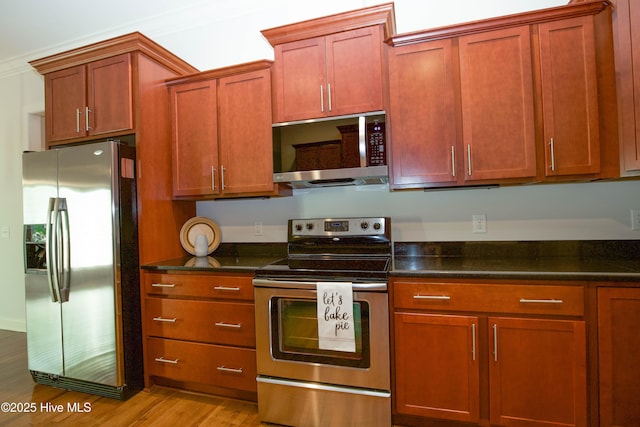 4 Cordelia Way, Vass, NC 28394 - kitchen featuring appliances with stainless steel finishes and light wood finished floors