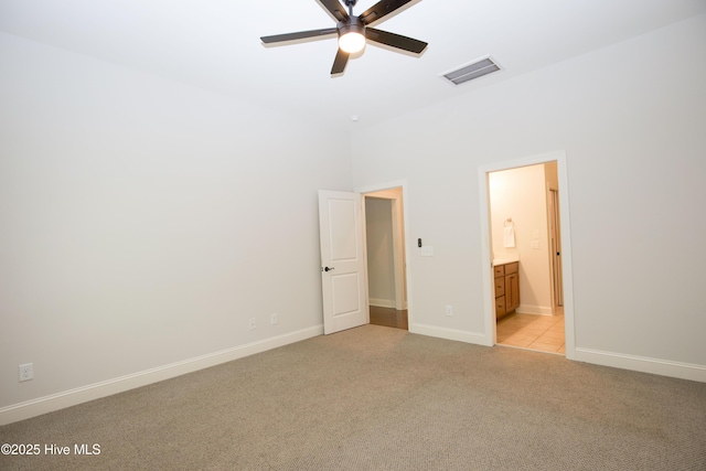 4 Cordelia Way, Vass, NC 28394 - unfurnished bedroom featuring baseboards, visible vents, light carpet, and ensuite bathroom