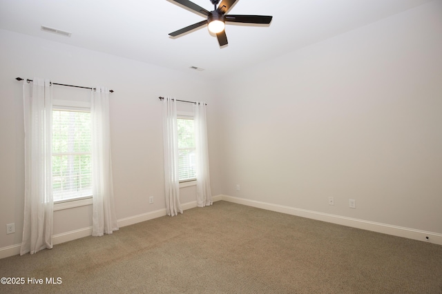 4 Cordelia Way, Vass, NC 28394 - unfurnished room with a wealth of natural light, ceiling fan, visible vents, and light colored carpet
