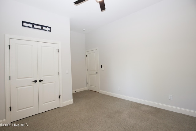 4 Cordelia Way, Vass, NC 28394 - unfurnished bedroom with baseboards, light colored carpet, ceiling fan, and a closet