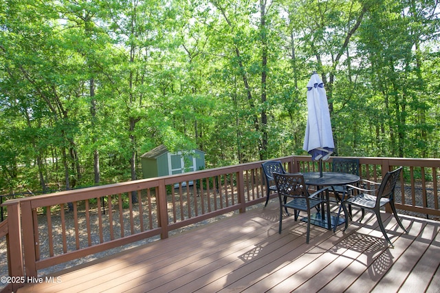 4 Cordelia Way, Vass, NC 28394 - wooden terrace with a storage shed, an outdoor structure, and outdoor dining area